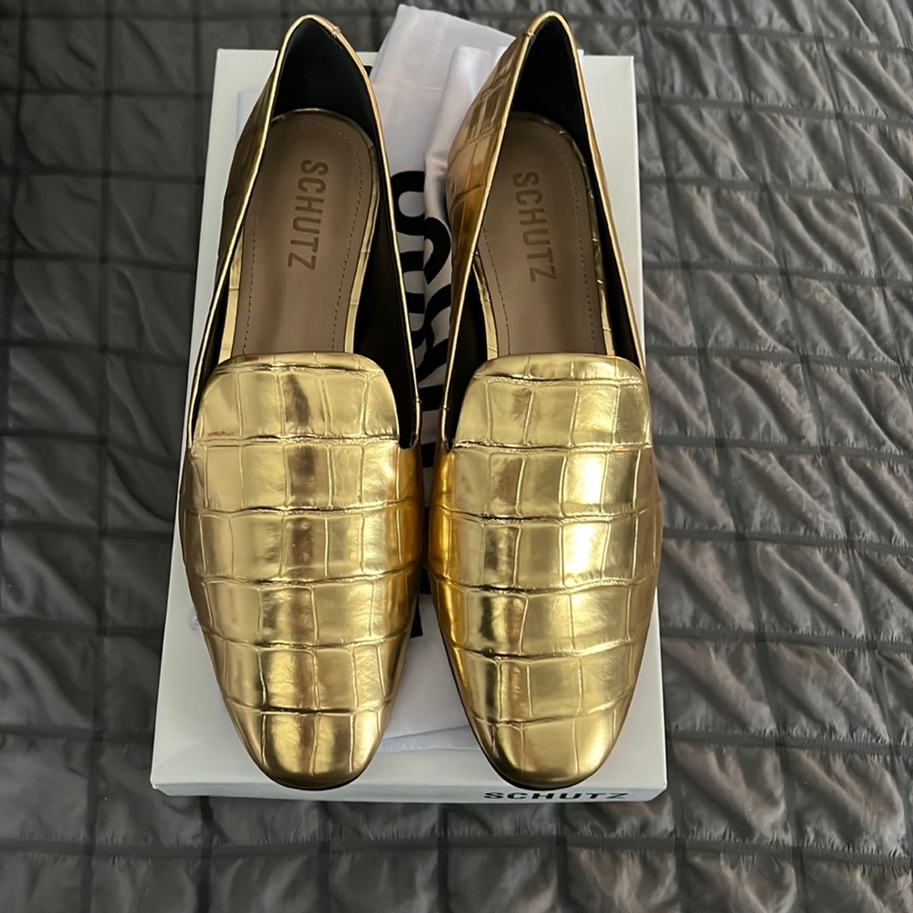 Schutz gold loafers